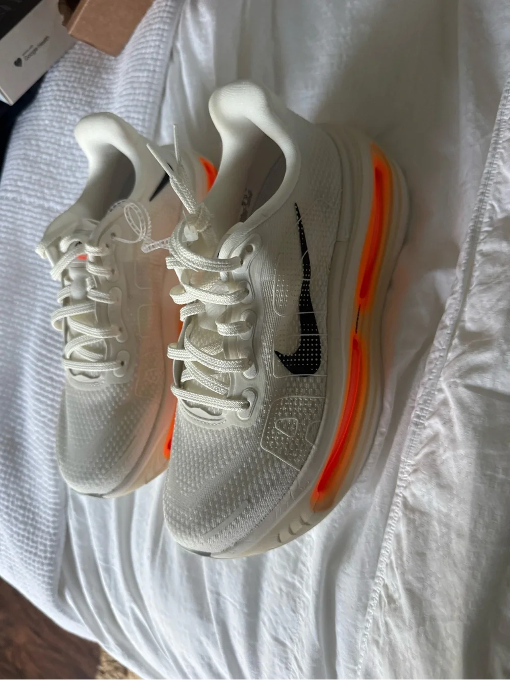 Nike White Athletic Shoes with Black Swoosh and Orange Accent Men 5.5/Women 7